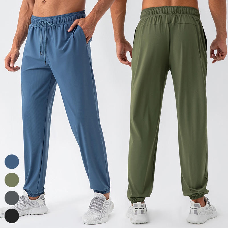 Quick Dry Stretch Breathable Lightweight Sports Pants With Drawstring Reflective Stripes And Zippered Side Pockets For Men - Image 2